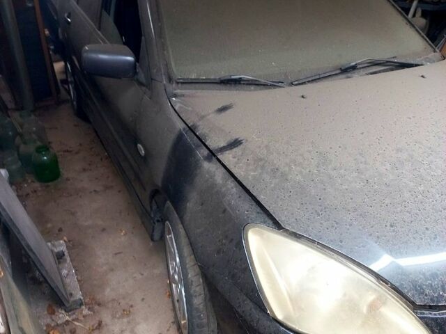 Серый Мицубиси Лансер, объемом двигателя 1.6 л и пробегом 234 тыс. км за 2500 $, фото 7 на Automoto.ua