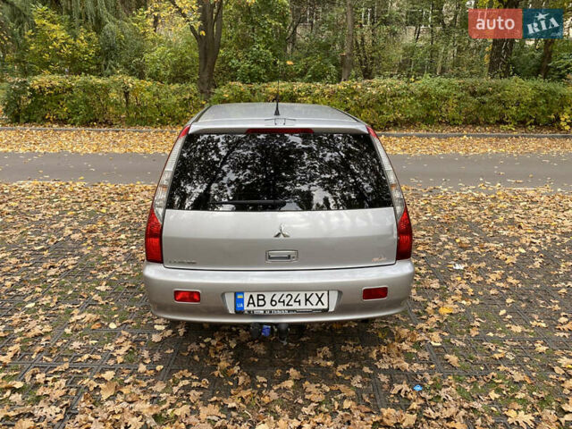 Серый Мицубиси Лансер, объемом двигателя 1.58 л и пробегом 240 тыс. км за 4800 $, фото 7 на Automoto.ua