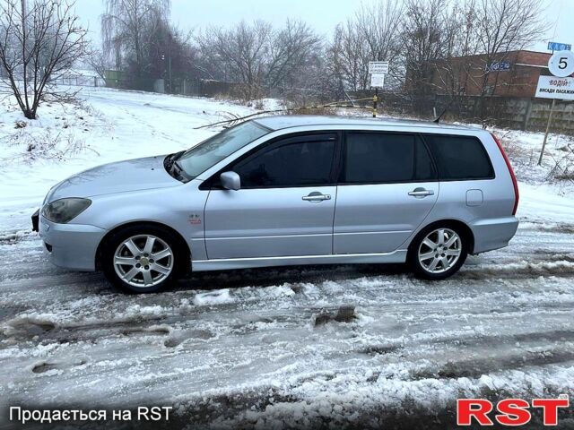 Сірий Міцубісі Lancer, об'ємом двигуна 1.6 л та пробігом 253 тис. км за 4000 $, фото 1 на Automoto.ua