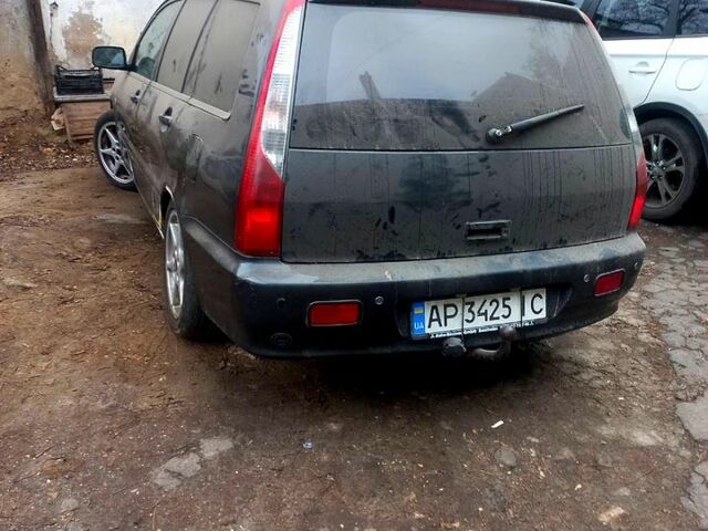 Серый Мицубиси Лансер, объемом двигателя 1.6 л и пробегом 234 тыс. км за 2500 $, фото 8 на Automoto.ua