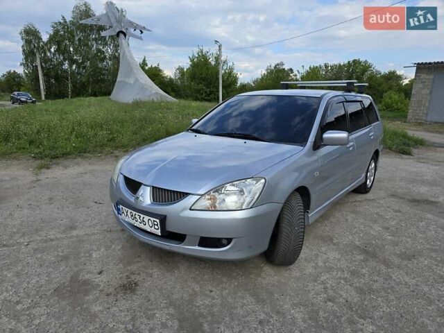 Сірий Міцубісі Lancer, об'ємом двигуна 1.6 л та пробігом 244 тис. км за 4300 $, фото 1 на Automoto.ua