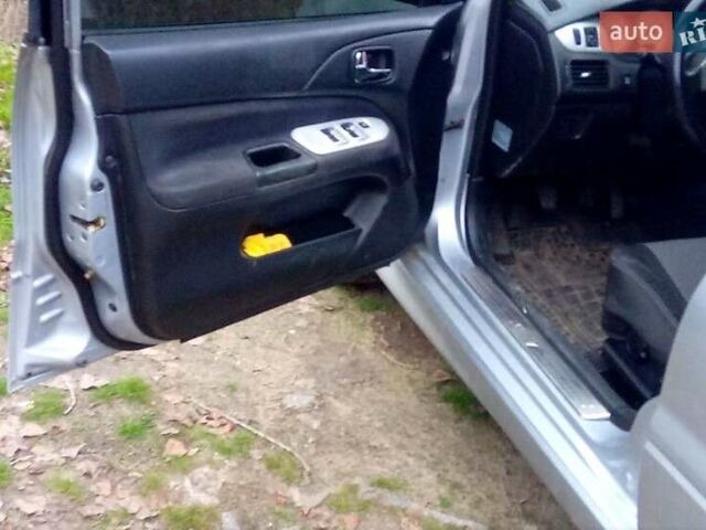 Сірий Міцубісі Lancer, об'ємом двигуна 2 л та пробігом 352 тис. км за 3950 $, фото 9 на Automoto.ua