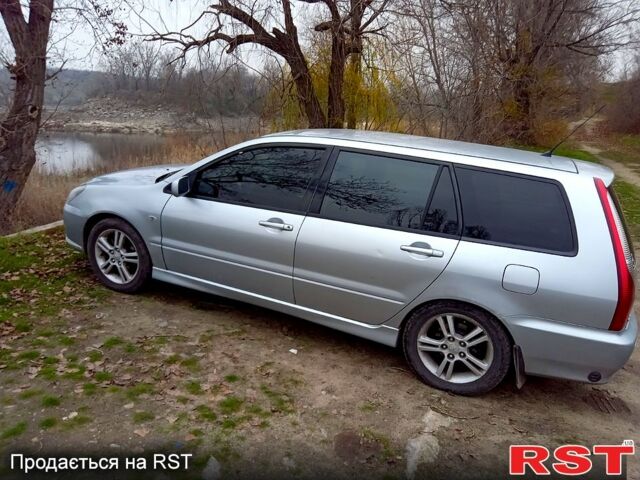 Серый Мицубиси Лансер, объемом двигателя 2 л и пробегом 352 тыс. км за 3950 $, фото 3 на Automoto.ua