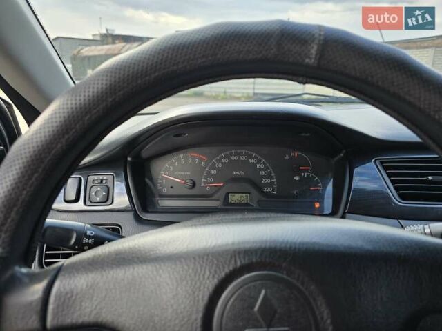 Сірий Міцубісі Lancer, об'ємом двигуна 1.6 л та пробігом 244 тис. км за 4300 $, фото 8 на Automoto.ua