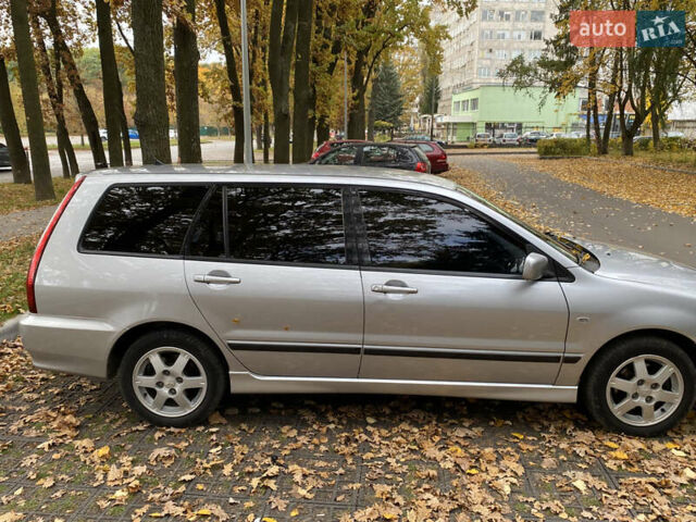 Серый Мицубиси Лансер, объемом двигателя 1.58 л и пробегом 240 тыс. км за 4800 $, фото 5 на Automoto.ua