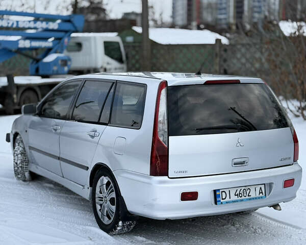 Сірий Міцубісі Lancer, об'ємом двигуна 2 л та пробігом 322 тис. км за 3300 $, фото 4 на Automoto.ua