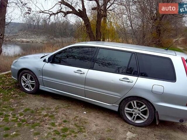 Сірий Міцубісі Lancer, об'ємом двигуна 2 л та пробігом 352 тис. км за 3950 $, фото 2 на Automoto.ua