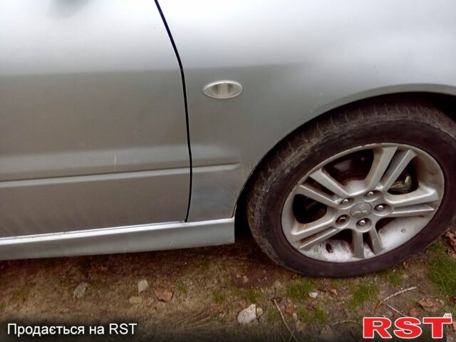 Серый Мицубиси Лансер, объемом двигателя 2 л и пробегом 352 тыс. км за 3950 $, фото 8 на Automoto.ua