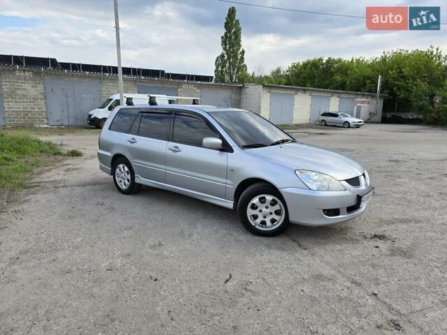 Сірий Міцубісі Lancer, об'ємом двигуна 1.6 л та пробігом 244 тис. км за 4300 $, фото 3 на Automoto.ua