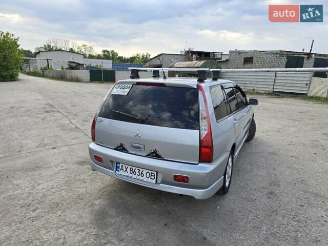 Сірий Міцубісі Lancer, об'ємом двигуна 1.6 л та пробігом 244 тис. км за 4300 $, фото 4 на Automoto.ua