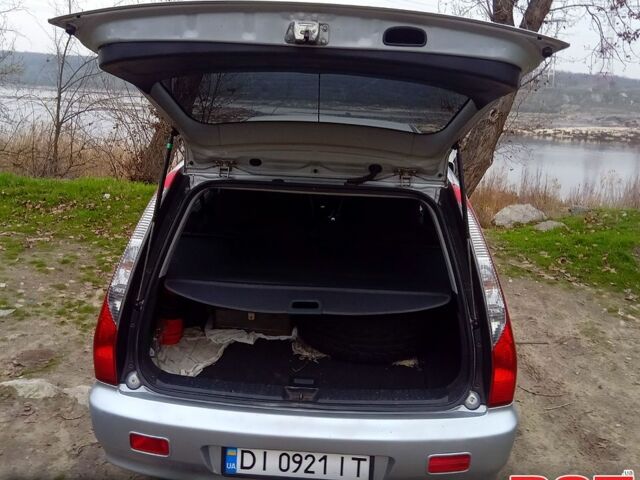 Серый Мицубиси Лансер, объемом двигателя 2 л и пробегом 352 тыс. км за 3950 $, фото 4 на Automoto.ua