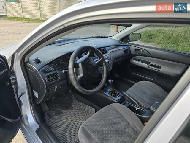 Сірий Міцубісі Lancer, об'ємом двигуна 1.6 л та пробігом 244 тис. км за 4300 $, фото 6 на Automoto.ua