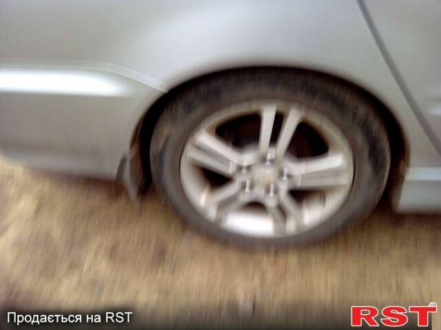 Серый Мицубиси Лансер, объемом двигателя 2 л и пробегом 352 тыс. км за 3950 $, фото 7 на Automoto.ua