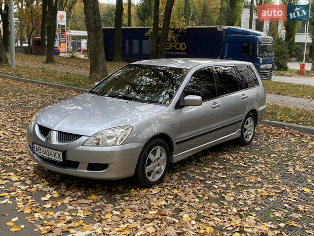 Серый Мицубиси Лансер, объемом двигателя 1.58 л и пробегом 240 тыс. км за 4800 $, фото 3 на Automoto.ua
