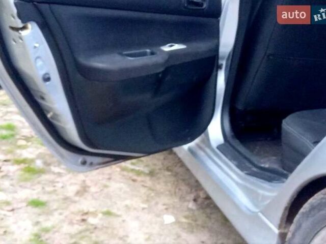 Сірий Міцубісі Lancer, об'ємом двигуна 2 л та пробігом 352 тис. км за 3950 $, фото 11 на Automoto.ua