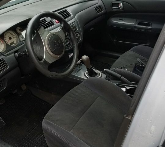 Сірий Міцубісі Lancer, об'ємом двигуна 1.6 л та пробігом 250 тис. км за 2500 $, фото 1 на Automoto.ua