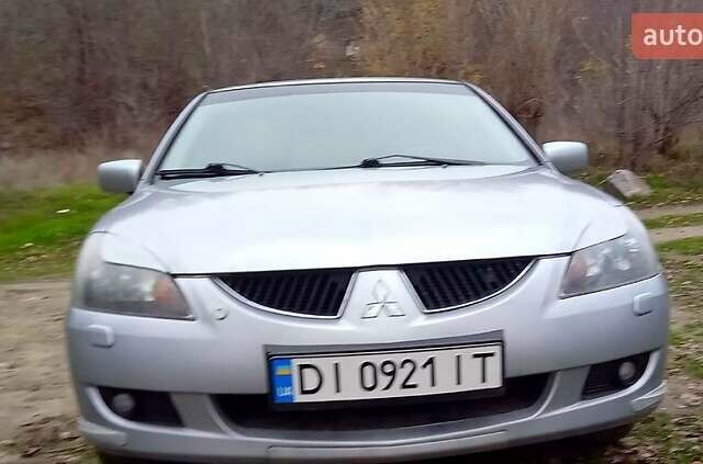 Сірий Міцубісі Lancer, об'ємом двигуна 2 л та пробігом 352 тис. км за 3950 $, фото 13 на Automoto.ua