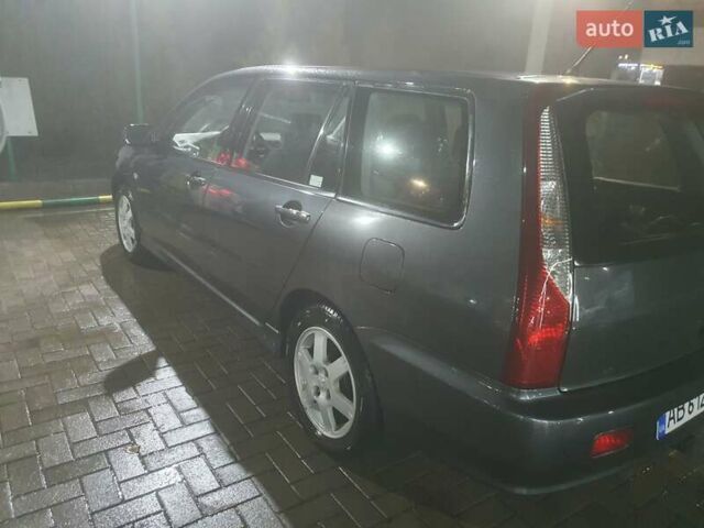 Сірий Міцубісі Lancer, об'ємом двигуна 1.6 л та пробігом 237 тис. км за 4800 $, фото 14 на Automoto.ua