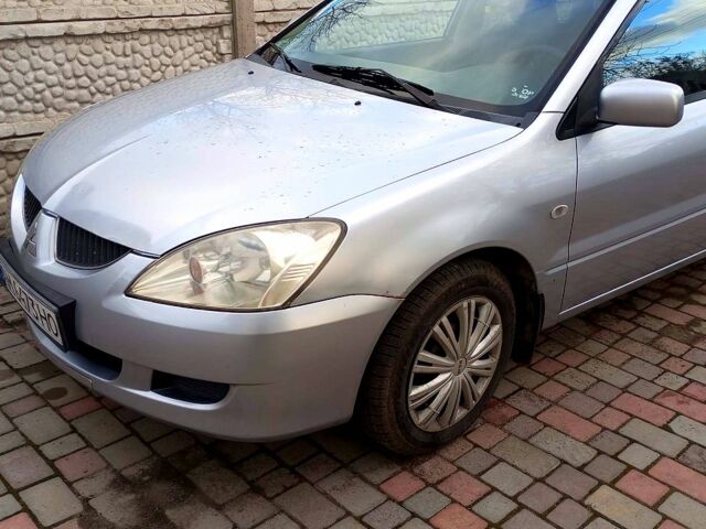 Сірий Міцубісі Lancer, об'ємом двигуна 16 л та пробігом 248 тис. км за 4000 $, фото 11 на Automoto.ua