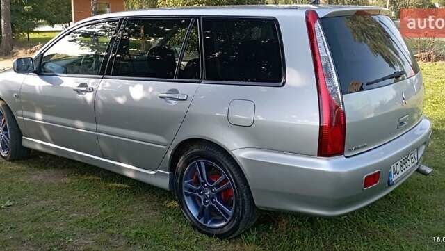 Серый Мицубиси Лансер, объемом двигателя 1.58 л и пробегом 231 тыс. км за 4500 $, фото 7 на Automoto.ua