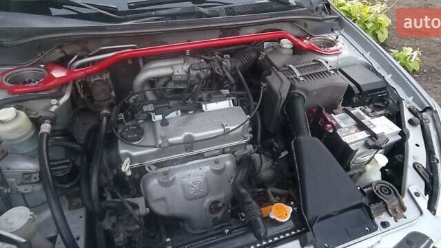 Серый Мицубиси Лансер, объемом двигателя 1.58 л и пробегом 231 тыс. км за 4500 $, фото 11 на Automoto.ua