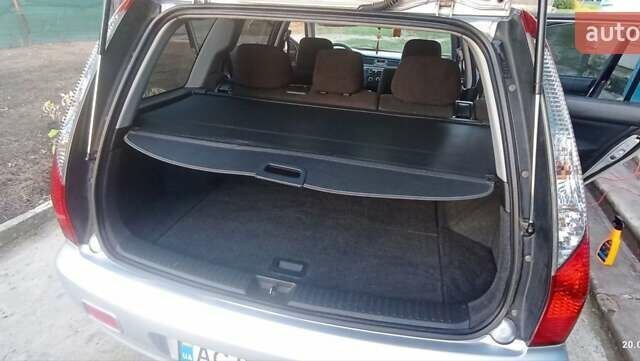 Серый Мицубиси Лансер, объемом двигателя 1.58 л и пробегом 231 тыс. км за 4500 $, фото 4 на Automoto.ua