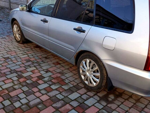 Сірий Міцубісі Lancer, об'ємом двигуна 16 л та пробігом 248 тис. км за 4000 $, фото 8 на Automoto.ua