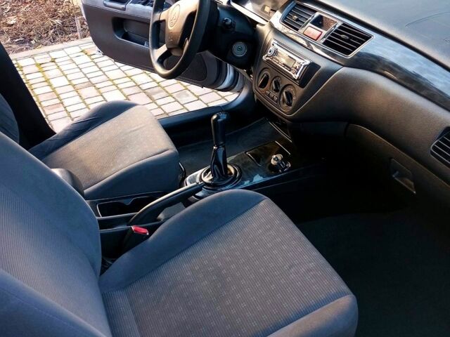 Сірий Міцубісі Lancer, об'ємом двигуна 16 л та пробігом 248 тис. км за 4000 $, фото 4 на Automoto.ua