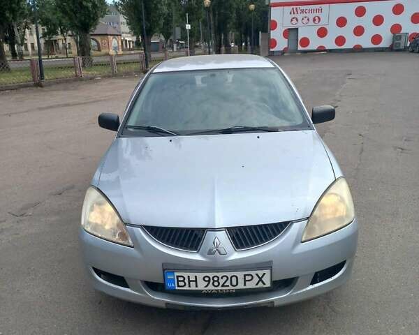 Сірий Міцубісі Lancer, об'ємом двигуна 1.6 л та пробігом 420 тис. км за 3700 $, фото 4 на Automoto.ua