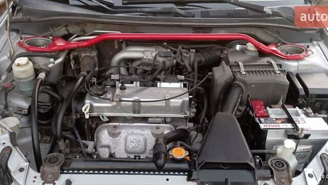 Серый Мицубиси Лансер, объемом двигателя 1.58 л и пробегом 231 тыс. км за 4500 $, фото 12 на Automoto.ua