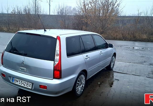 Серый Мицубиси Лансер, объемом двигателя 1.6 л и пробегом 213 тыс. км за 4500 $, фото 1 на Automoto.ua