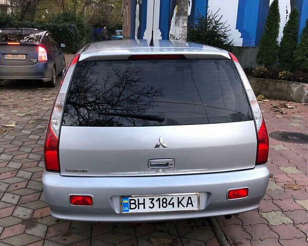 Серый Мицубиси Лансер, объемом двигателя 1.58 л и пробегом 240 тыс. км за 3500 $, фото 3 на Automoto.ua