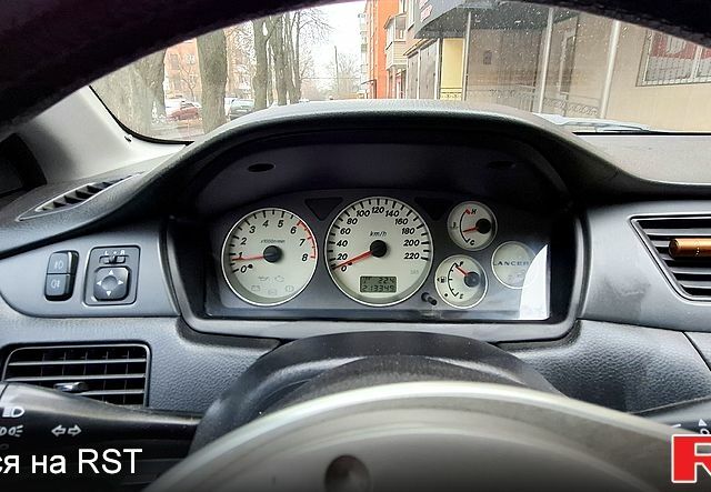 Серый Мицубиси Лансер, объемом двигателя 1.6 л и пробегом 213 тыс. км за 4500 $, фото 5 на Automoto.ua