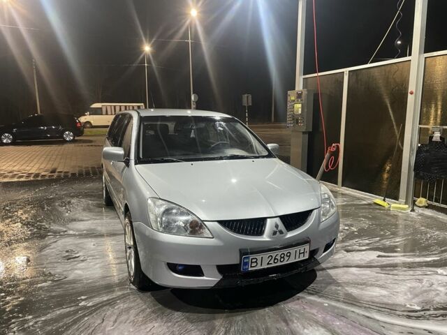Сірий Міцубісі Lancer, об'ємом двигуна 1.6 л та пробігом 396 тис. км за 3250 $, фото 1 на Automoto.ua