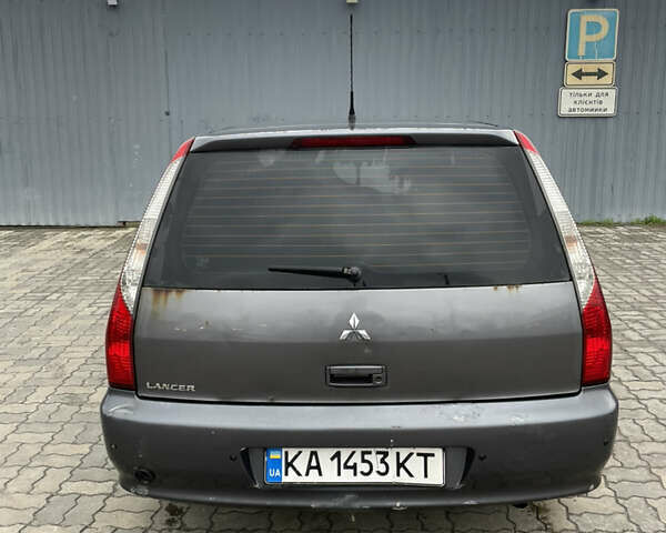Серый Мицубиси Лансер, объемом двигателя 1.6 л и пробегом 667 тыс. км за 2999 $, фото 3 на Automoto.ua