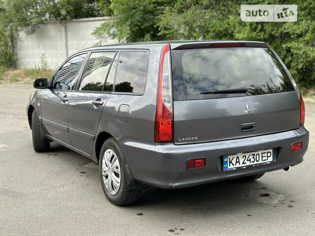 Сірий Міцубісі Lancer, об'ємом двигуна 1.6 л та пробігом 240 тис. км за 4600 $, фото 8 на Automoto.ua