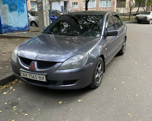 Сірий Міцубісі Lancer, об'ємом двигуна 1.6 л та пробігом 280 тис. км за 4200 $, фото 1 на Automoto.ua