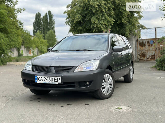 Сірий Міцубісі Lancer, об'ємом двигуна 1.6 л та пробігом 240 тис. км за 4600 $, фото 11 на Automoto.ua