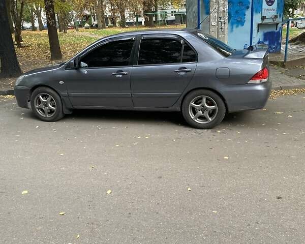 Сірий Міцубісі Lancer, об'ємом двигуна 1.6 л та пробігом 280 тис. км за 4200 $, фото 6 на Automoto.ua