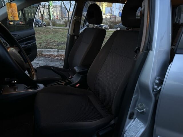 Серый Мицубиси Лансер, объемом двигателя 1.6 л и пробегом 220 тыс. км за 3999 $, фото 7 на Automoto.ua