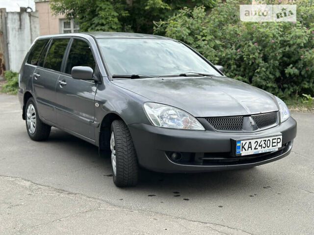 Сірий Міцубісі Lancer, об'ємом двигуна 1.6 л та пробігом 240 тис. км за 4600 $, фото 2 на Automoto.ua