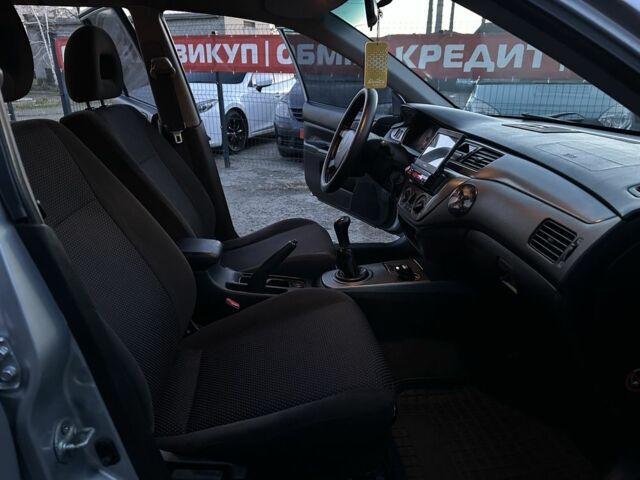 Серый Мицубиси Лансер, объемом двигателя 1.6 л и пробегом 220 тыс. км за 3999 $, фото 11 на Automoto.ua