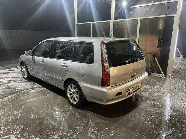 Сірий Міцубісі Lancer, об'ємом двигуна 1.6 л та пробігом 396 тис. км за 3250 $, фото 3 на Automoto.ua