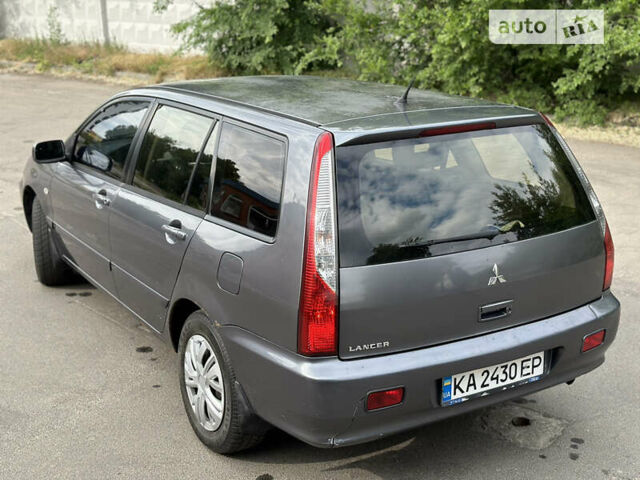 Сірий Міцубісі Lancer, об'ємом двигуна 1.6 л та пробігом 240 тис. км за 4600 $, фото 17 на Automoto.ua