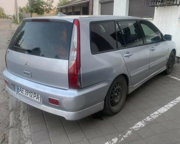 Серый Мицубиси Лансер, объемом двигателя 1.58 л и пробегом 175 тыс. км за 4100 $, фото 5 на Automoto.ua