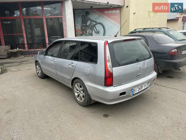 Сірий Міцубісі Lancer, об'ємом двигуна 1.6 л та пробігом 396 тис. км за 2900 $, фото 2 на Automoto.ua