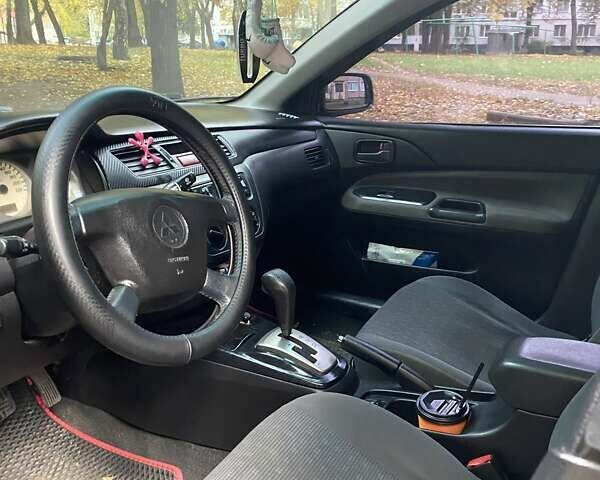 Сірий Міцубісі Lancer, об'ємом двигуна 1.6 л та пробігом 280 тис. км за 4200 $, фото 5 на Automoto.ua