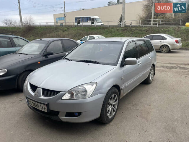 Сірий Міцубісі Lancer, об'ємом двигуна 1.6 л та пробігом 396 тис. км за 2900 $, фото 5 на Automoto.ua