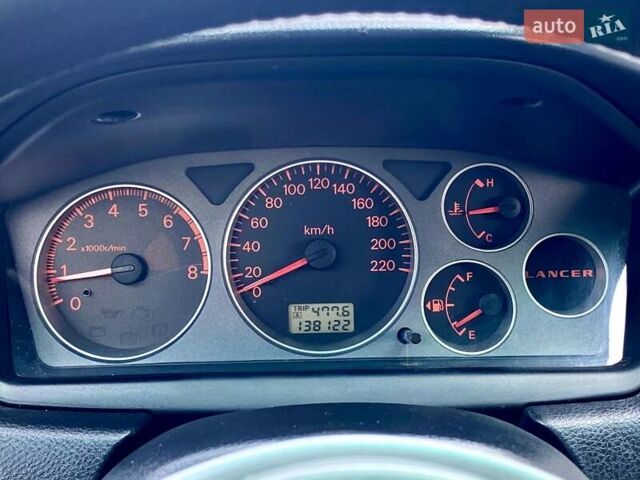 Серый Мицубиси Лансер, объемом двигателя 1.58 л и пробегом 138 тыс. км за 4000 $, фото 12 на Automoto.ua