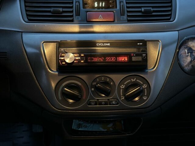 Серый Мицубиси Лансер, объемом двигателя 1.6 л и пробегом 220 тыс. км за 3999 $, фото 14 на Automoto.ua